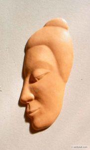 Relief of a Buddha profile